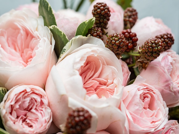 Beautiful wedding bouquet of shrub and peony gently pink roses.