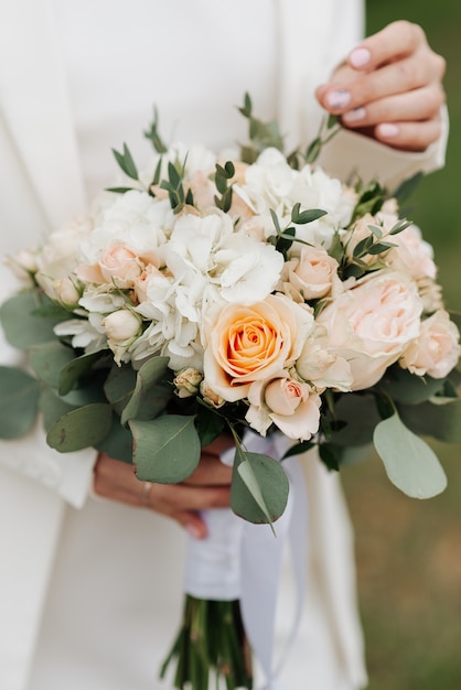 Beautiful wedding bridal bouquet of natural flowers close-up