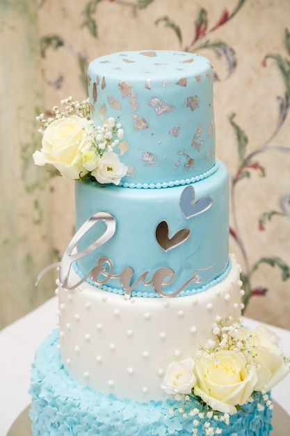 Beautiful wedding cake on the wedding day for newlyweds