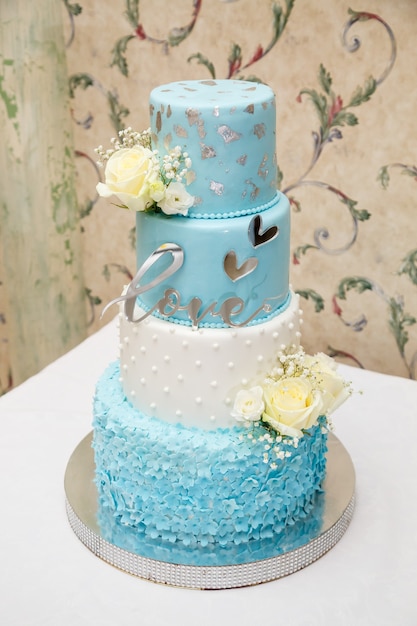 Beautiful wedding cake on the wedding day for newlyweds