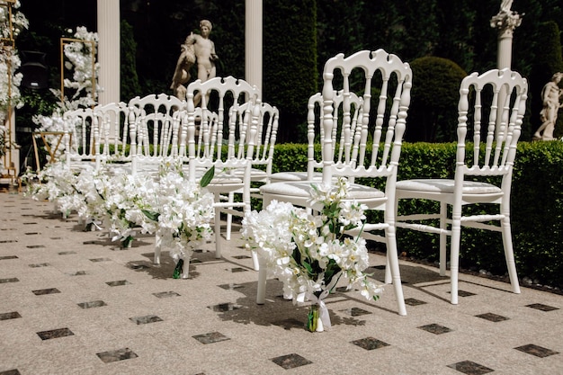 Beautiful wedding ceremony in the garden at sunset