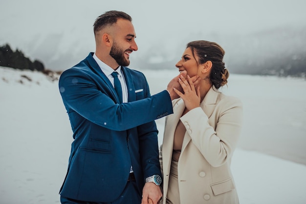 Beautiful wedding couple on their winter wedding