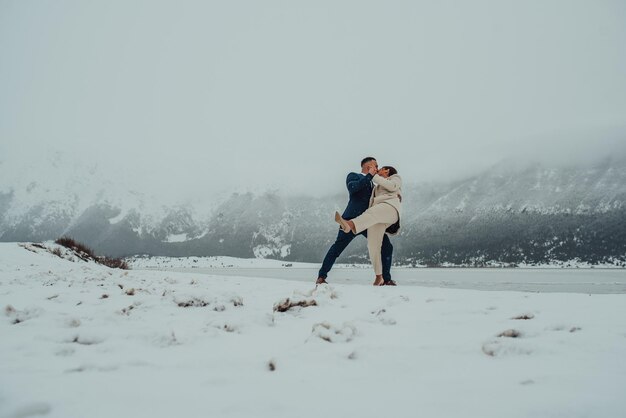 Beautiful wedding couple on their winter wedding