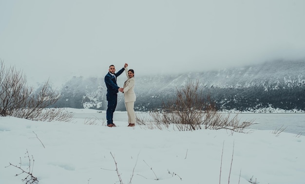 Beautiful wedding couple on their winter wedding