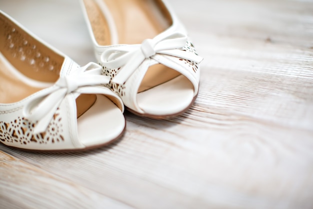 Beautiful wedding shoes of the bride.