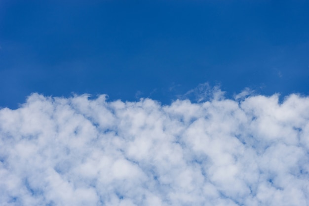 Beautiful white clouds with blue sky background.