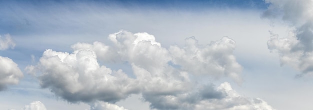 Beautiful white curly cloud in blue sky in pastel colors