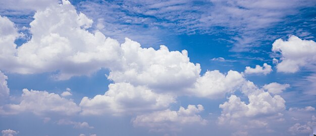 Beautiful white fluffys clouds sky background with blue sky background