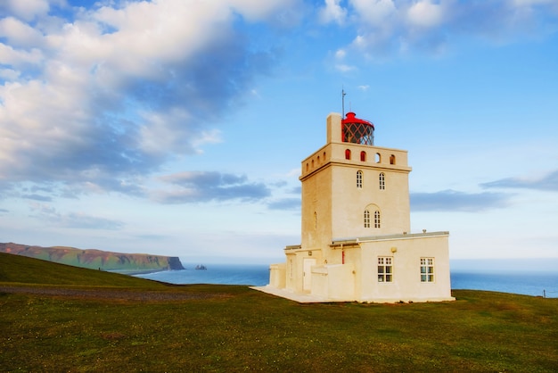 Beautiful white lighthouse at Cape Dyrholaey, South Iceland