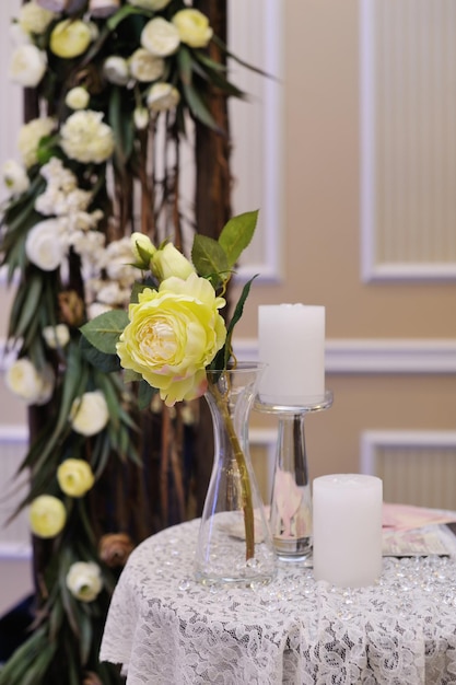 Beautiful white roses on wedding table