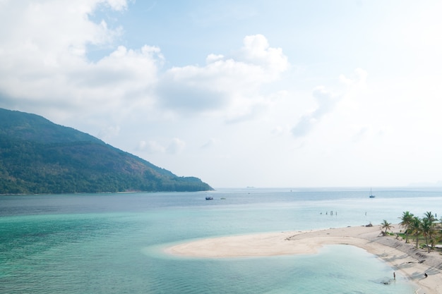 Beautiful white sandy beach in the summer time concept travel, holiday and vacation.