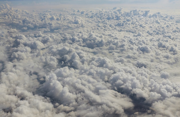 Beautiful with white clouds blue sky sea a view from an airplane