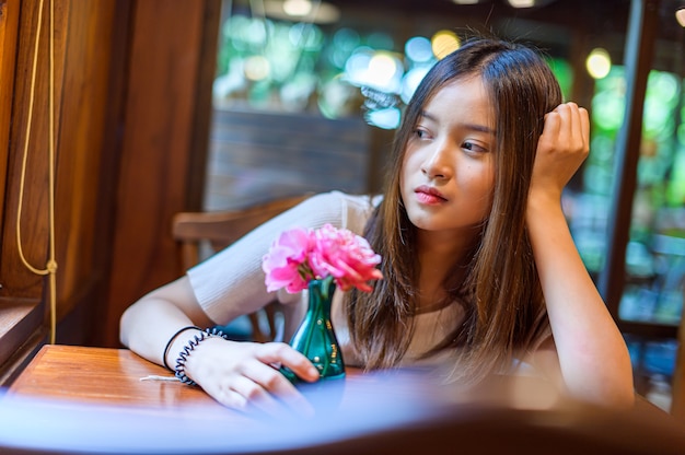 Beautiful woman at a cafe shop