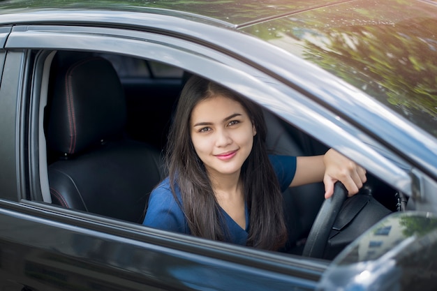 Beautiful woman in car