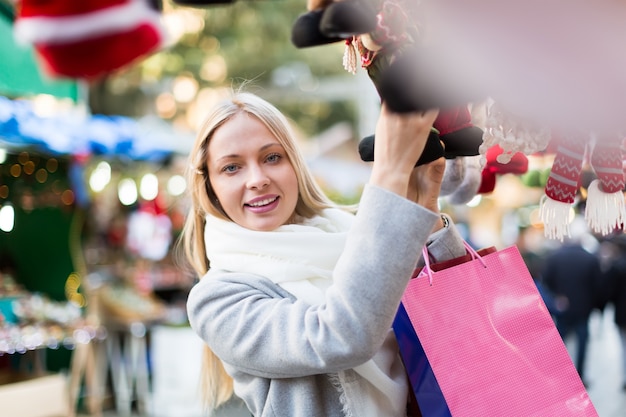 Beautiful woman at Christmas market