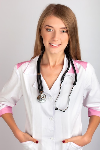 Beautiful woman doctor with a stethoscope