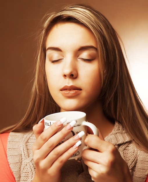 Beautiful woman drinking coffee