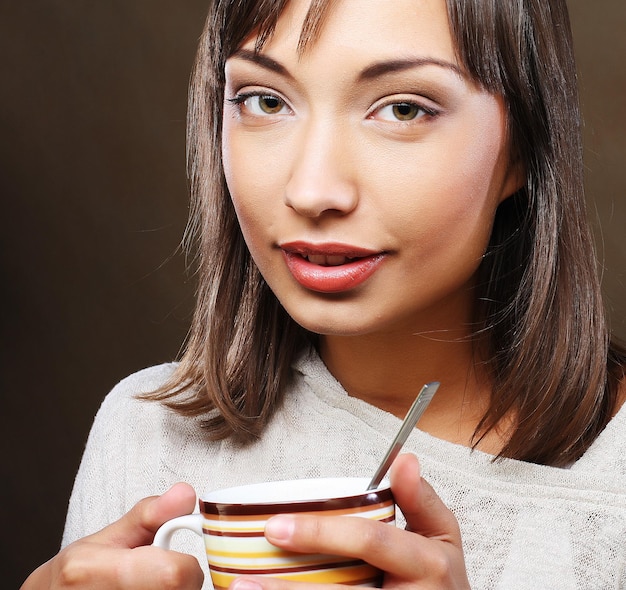 Beautiful woman drinking coffee