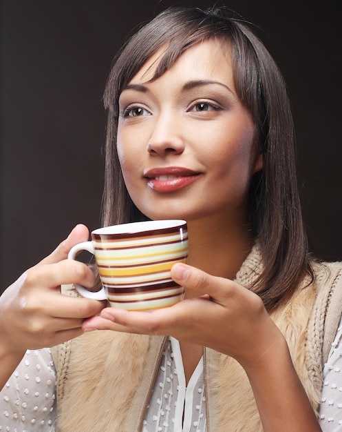 Beautiful woman drinking coffee