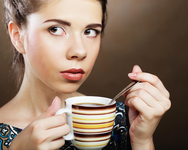 Beautiful woman drinking coffee