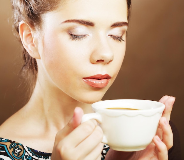 Beautiful woman drinking coffee