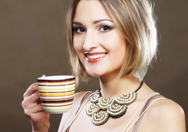 Beautiful woman drinking coffee