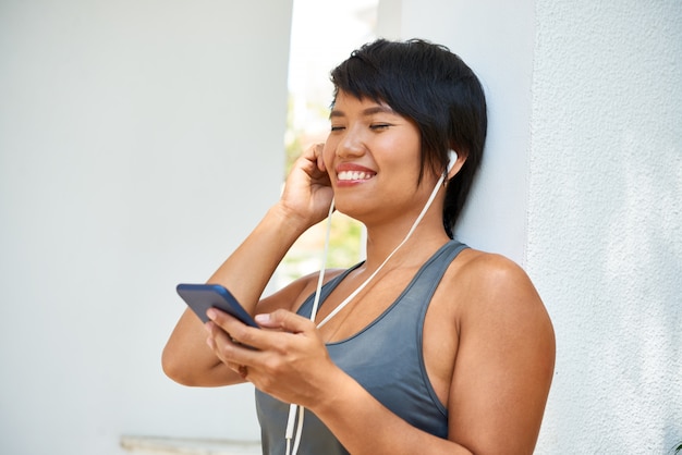 Beautiful woman enjoying good song