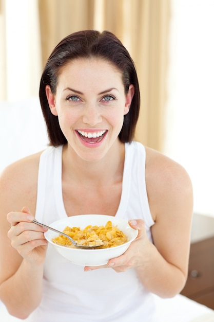 Beautiful woman having breakfast