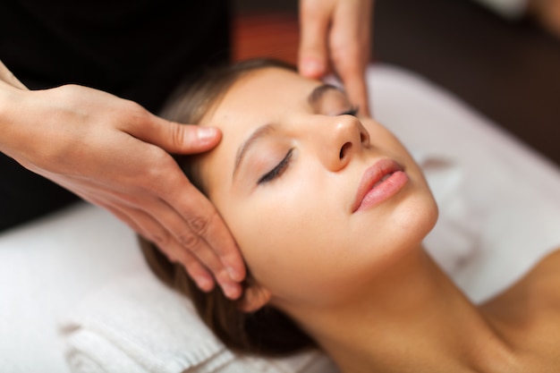 Beautiful woman having an head massage