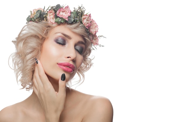 Beautiful woman isolated on white portrait Pretty model with makeup blonde curly hair and flowers