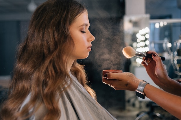 beautiful woman at make up salon