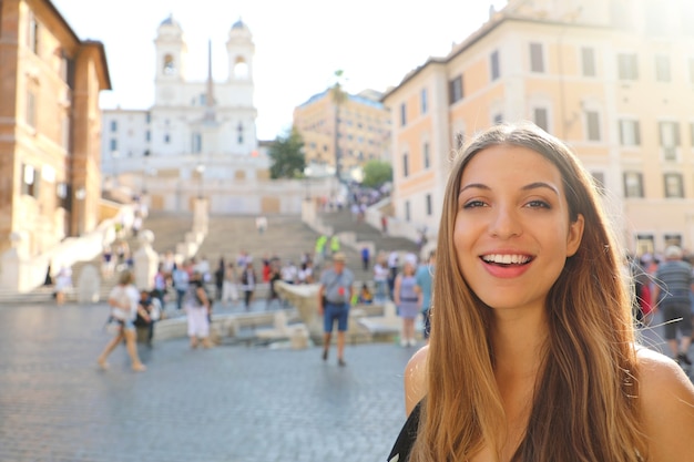 Beautiful woman in Piazza di Spagna square in Rome