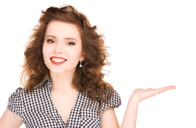 beautiful woman showing something on the palm of her hand