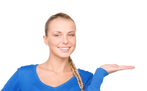 beautiful woman showing something on the palm of her hand