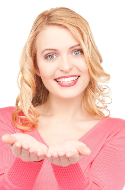 beautiful woman showing something on the palms of her hands