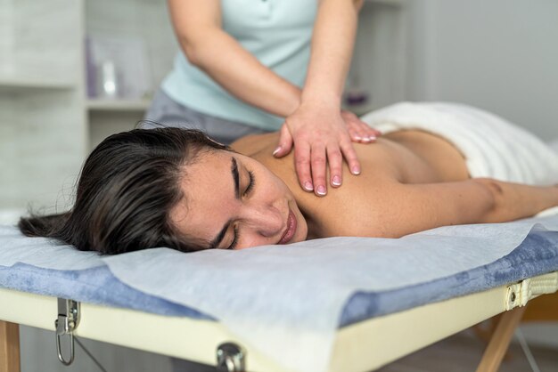 Beautiful woman in spa salon