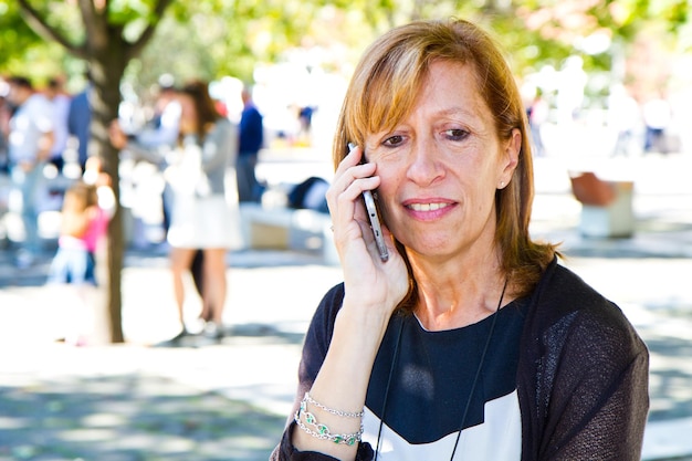 Beautiful woman talking on cell phone