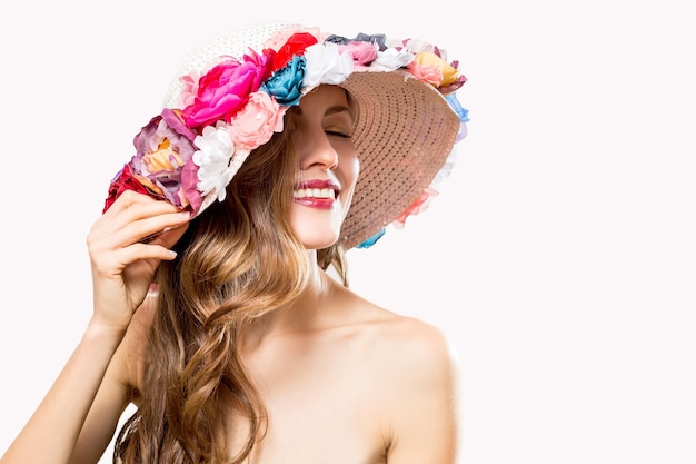 Beautiful woman wearing floral hat