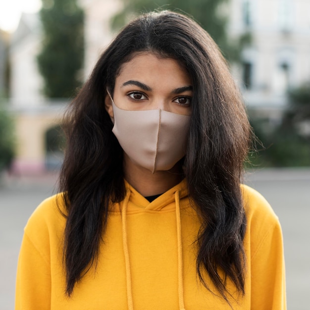 Beautiful woman wearing a medical mask