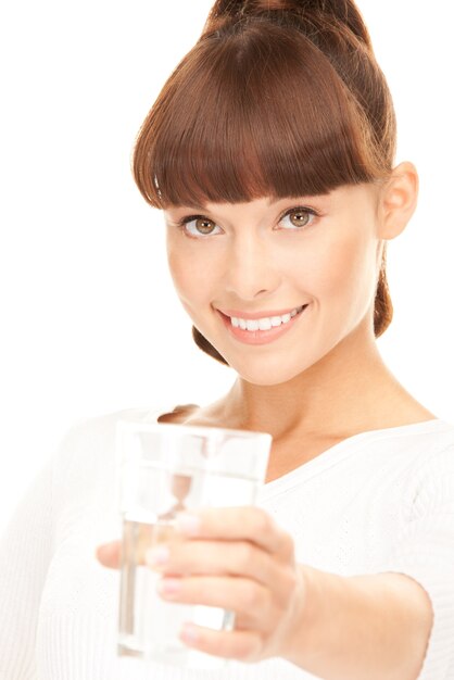 beautiful woman with glass of water over white