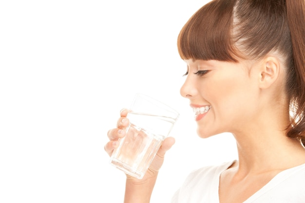 beautiful woman with glass of water over white