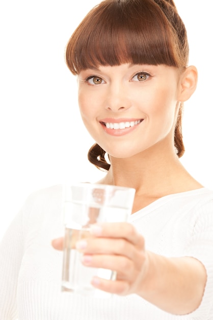 beautiful woman with glass of water over white