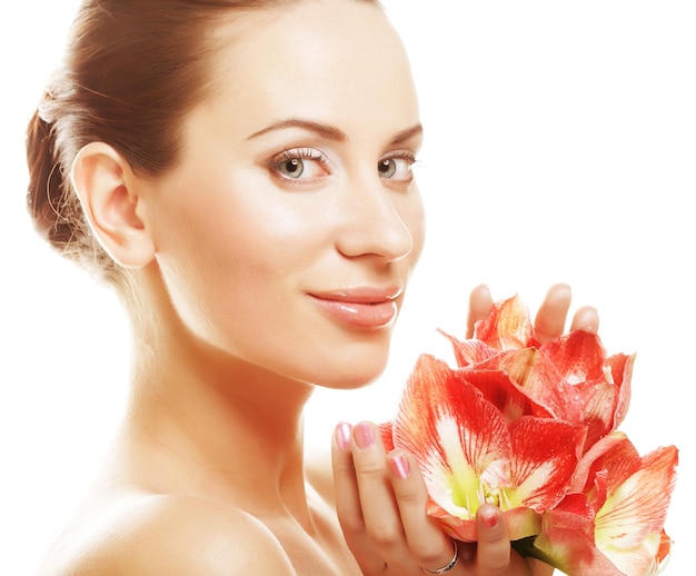 Beautiful woman with gorgeous pink flower