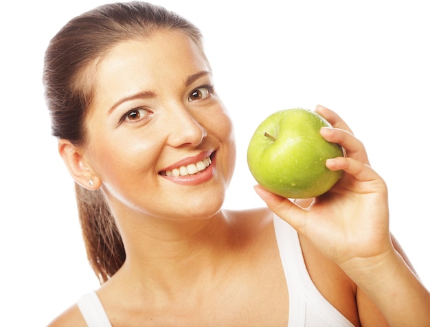 Beautiful woman with green apple