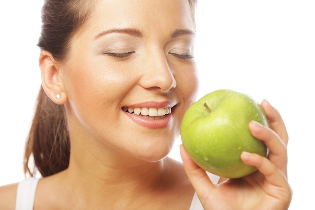 Beautiful woman with green apple