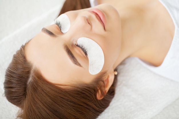 Beautiful Woman with long eyelashes in a beauty salon