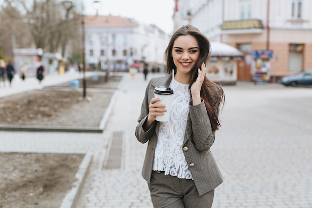 Beautiful woman with milkshake