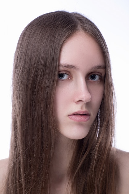 Beautiful woman with perfect looks in the studio on white background