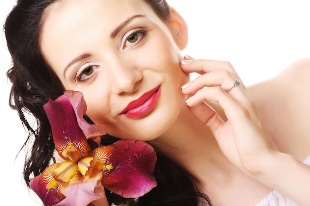 Beautiful woman with pink flower