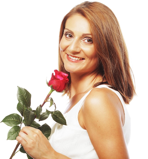 Beautiful woman with red rose isolated on white